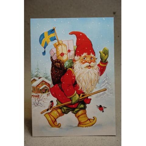 Vykort med Julmotiv - Glad Tomte - stämplat frimärke