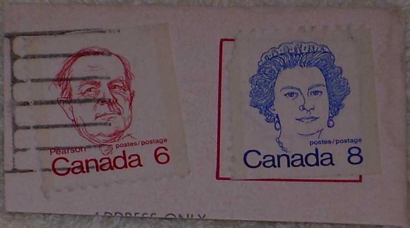 Några kanadensiska frimärken på klipp