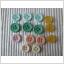 14 fina knappar i glada pastellfäger 9 - 12 mm. Se bilderna. Retro vintage